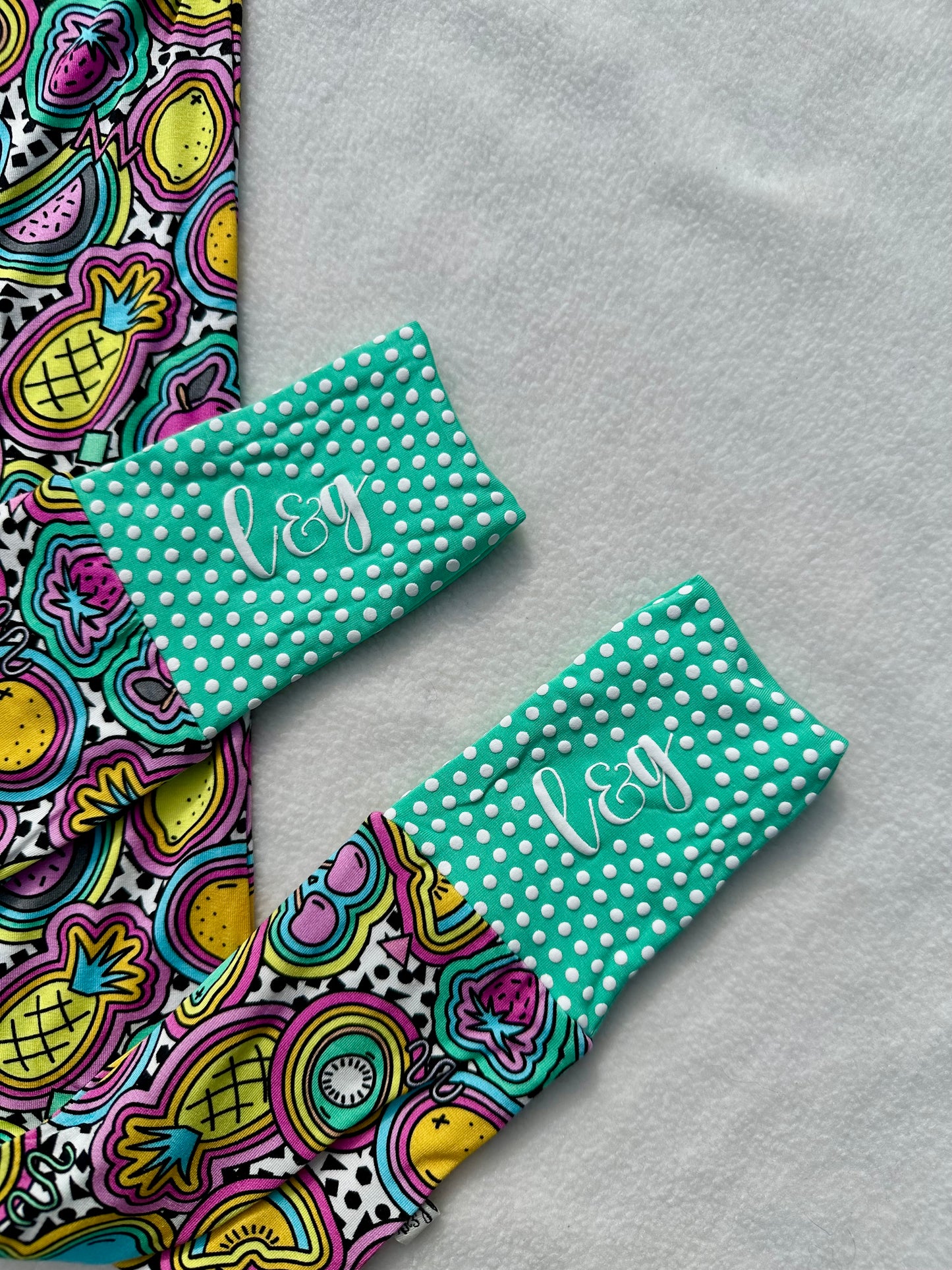 fruit frenzy zip romper